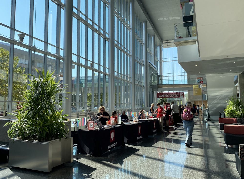Students browse study abroad tables in the Campus Center atrium during the Study Abroad Fair on Sept. 2. 