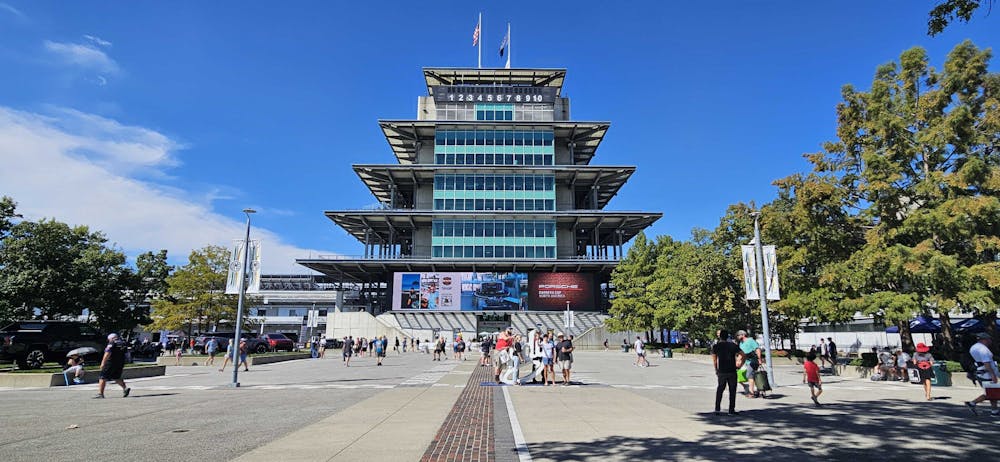 Racing fans mingle in Pagoda Plaza