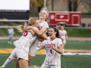 Senior Emma Antoine celebrates with Seniors Sam Slimak and Carlie Werner