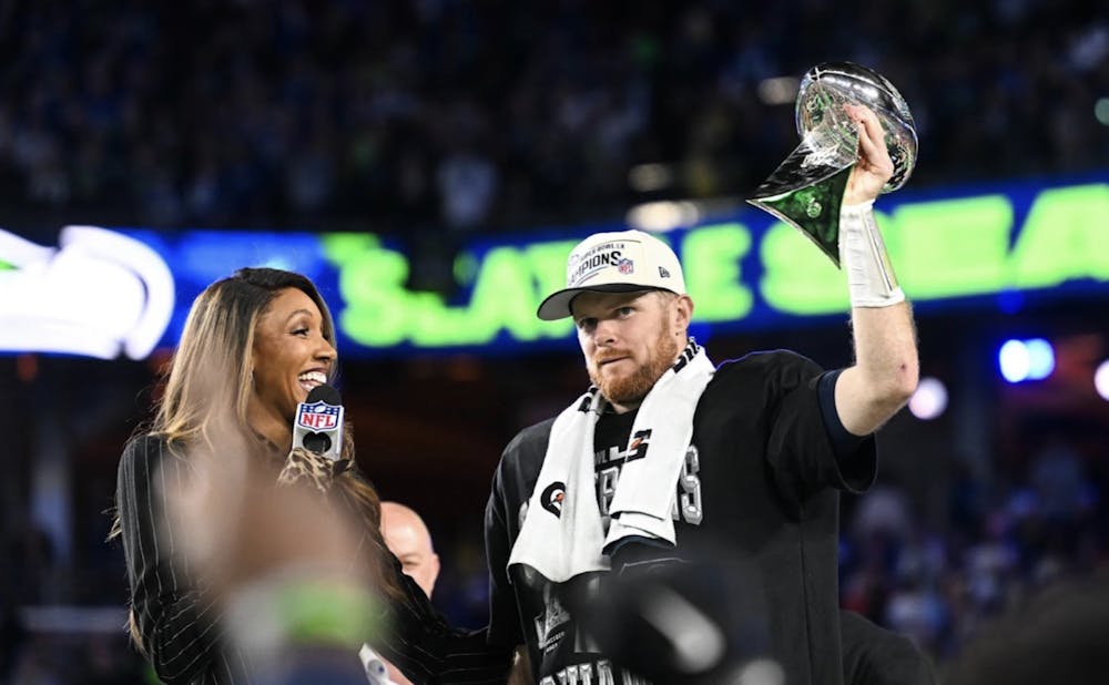 Seattle Seahawks quarterback Sam Darnold lifts the Vince Lombardi Trophy during the trophy presentation. (Photo courtesy of the Seattle Seahawks website)