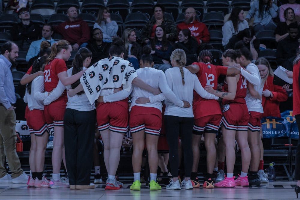The IU Indianapolis women’s basketball team huddles during a timeout.