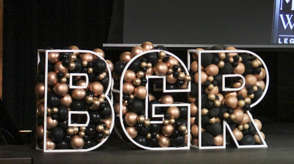 A BGR balloon sign sits on stage