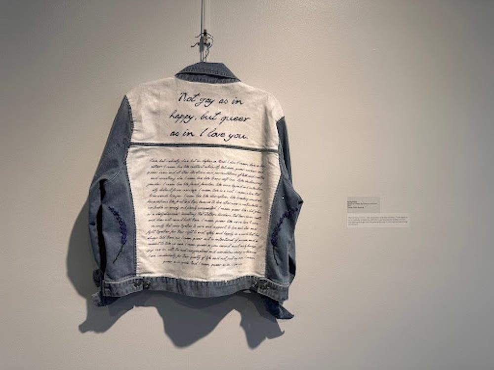 “Not Gay as in Happy, But Queer as in I Love You” by Kal Demaree.