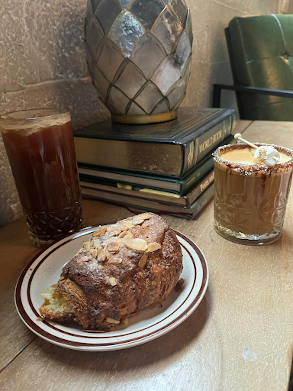 Almond croissant, iced Americano and Fireside latte from Public Parlor House.
