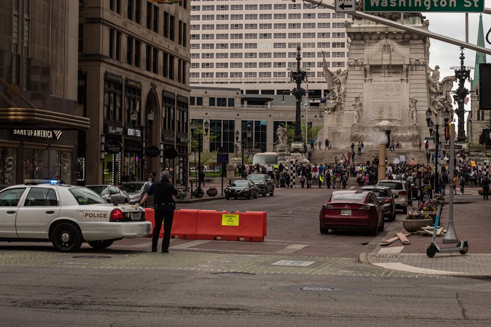 <p>The police blockade the road for the abortion-rights protestors on May 4, 2022 on Monument Circle.</p>