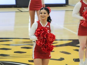 Katie Huang '26 Cheers at Center Court