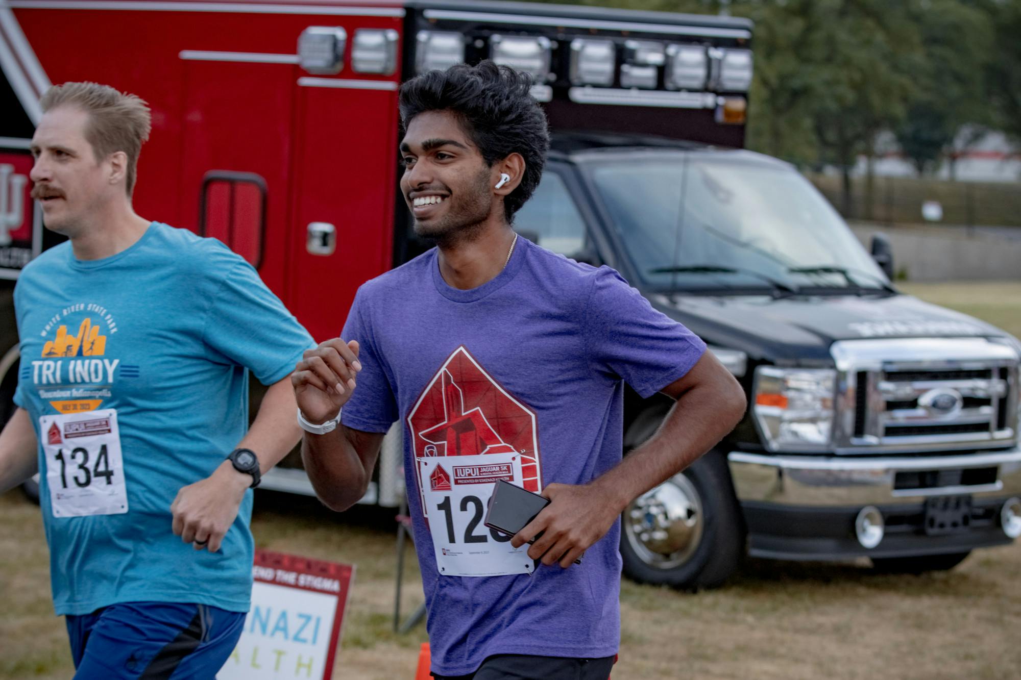 Tarun Namala runs out of Carroll Stadium
