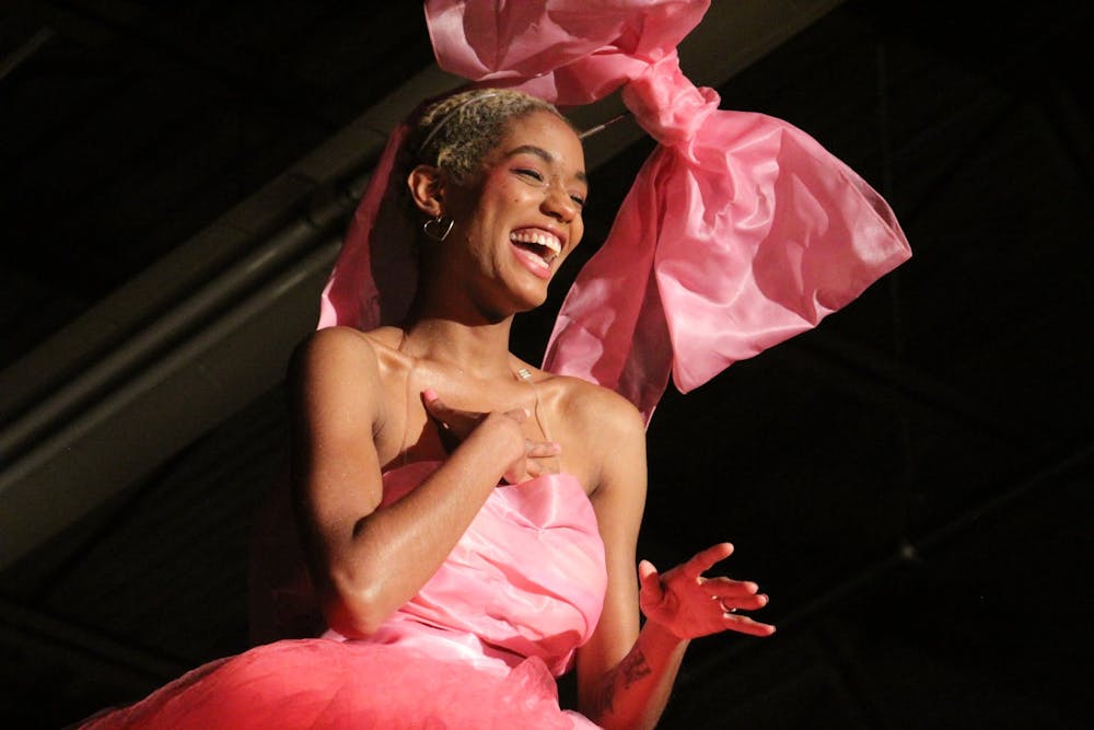 <p>Morgan Robinson-Gay opens the 2021 event in a 13-foot towering pink gown.﻿</p>