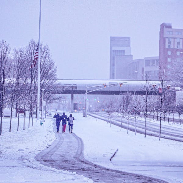 Students Walk on Snow Cleared Sidewalk