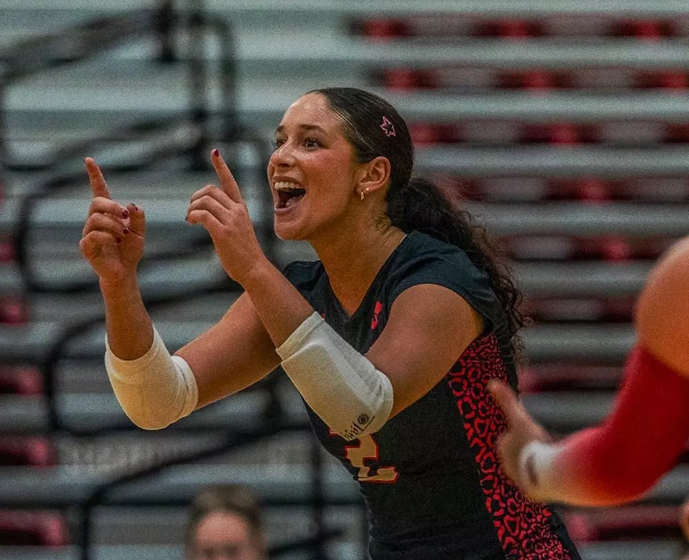 <p>IU Indy celebrates during its five-set win over Akron on Sept. 5 at the Jungle, closing out the Hampton Inn Invitational. (Photo courtesy of IU Indy Athletics)</p>