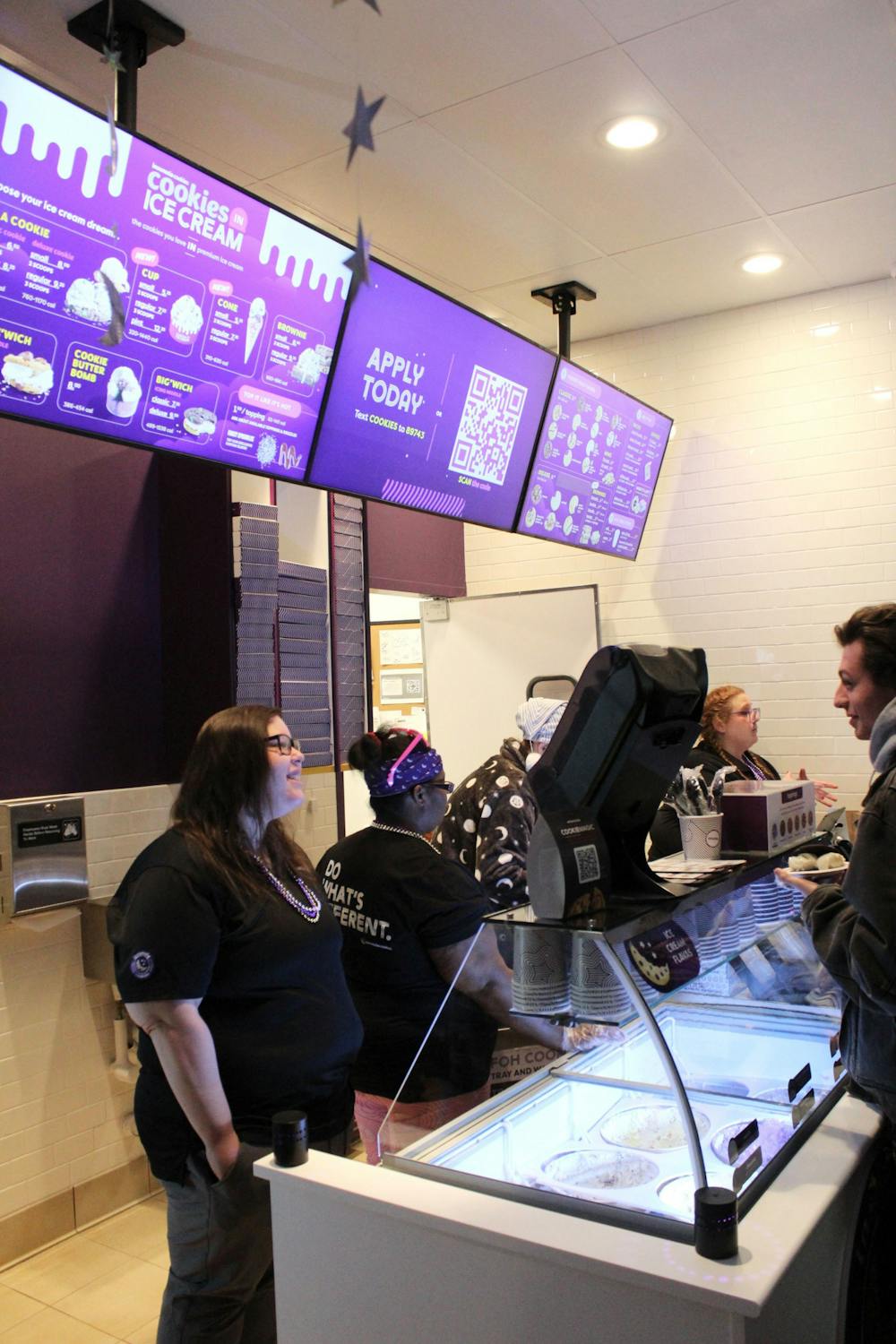 <p>Patrons order cookies at the Grand Opening of the new Insomnia Cookies ﻿near IUPUI campus.</p>
