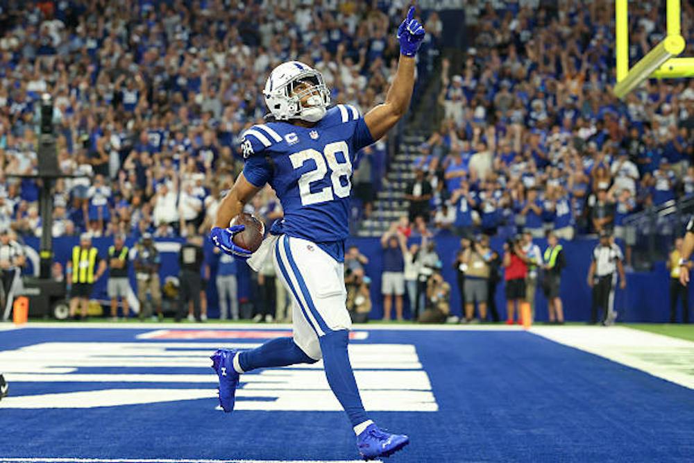 INDIANAPOLIS, INDIANA - SEPTEMBER 13: Jonathan Taylor #28 of the Indianapolis Colts celebrates after scoring a touchdown against the Baltimore Ravens during the second quarter of the game at Lucas Oil Stadium on September 13, 2026 in Indianapolis, Indiana. (Photo by Andy Lyons/Getty Images)