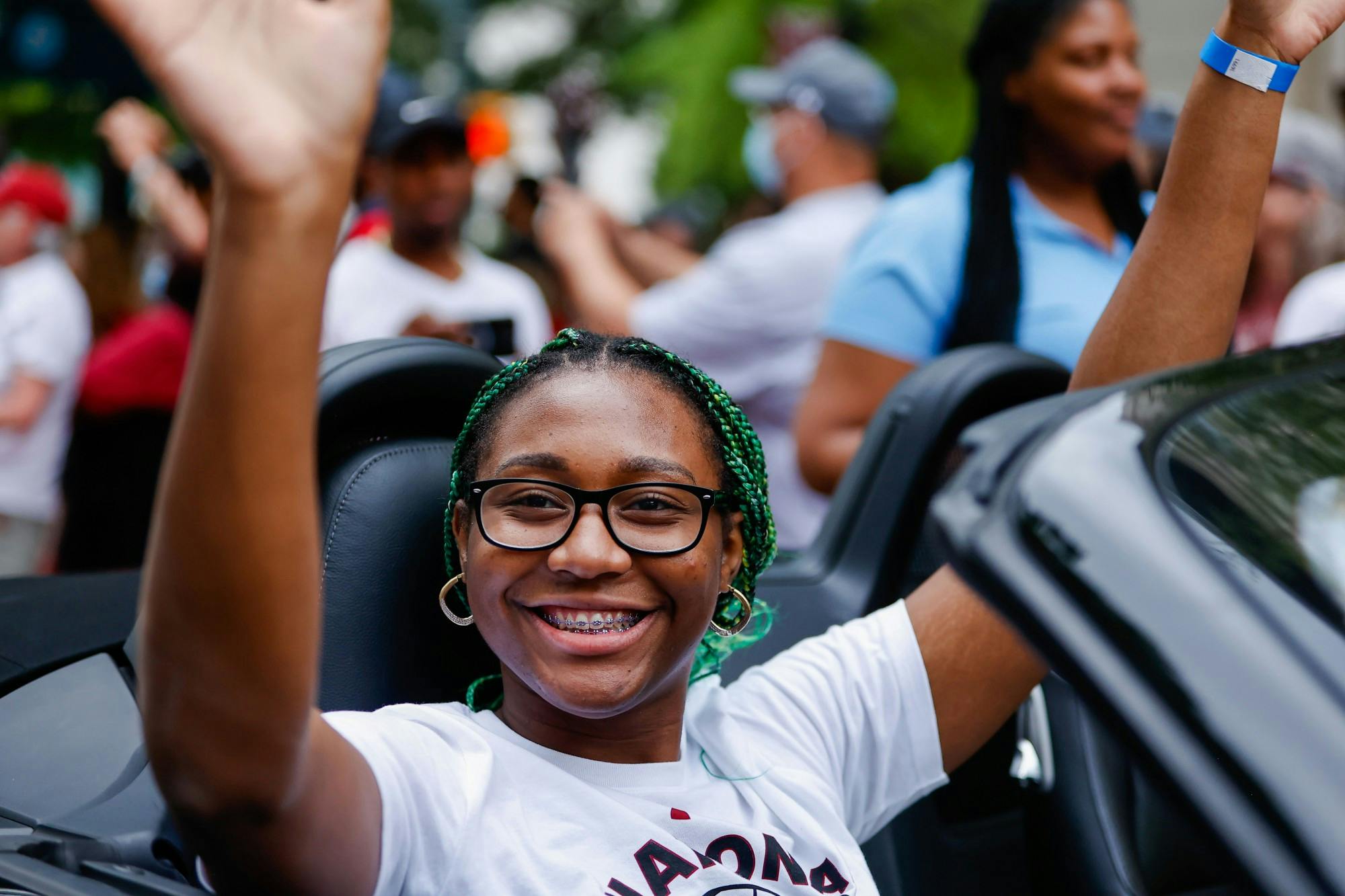 Junior forward Aliyah Boston waves from a car during a parade in honor of the Women’s Basketball team on April 13, 2022. 