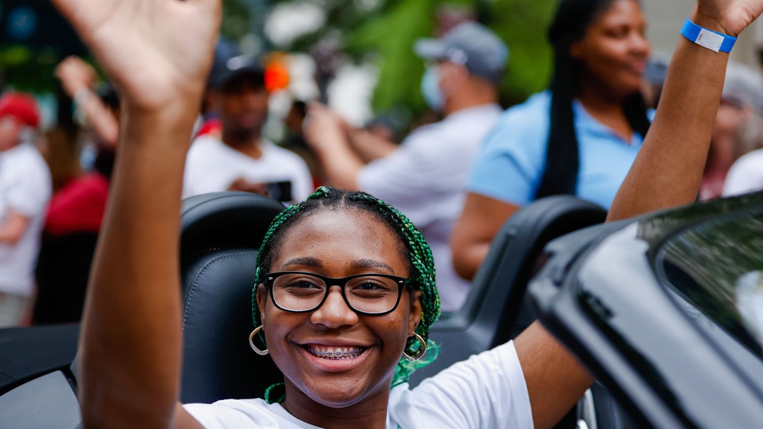 Junior forward Aliyah Boston waves from a car during a parade in honor of the Women’s Basketball team on April 13, 2022. 