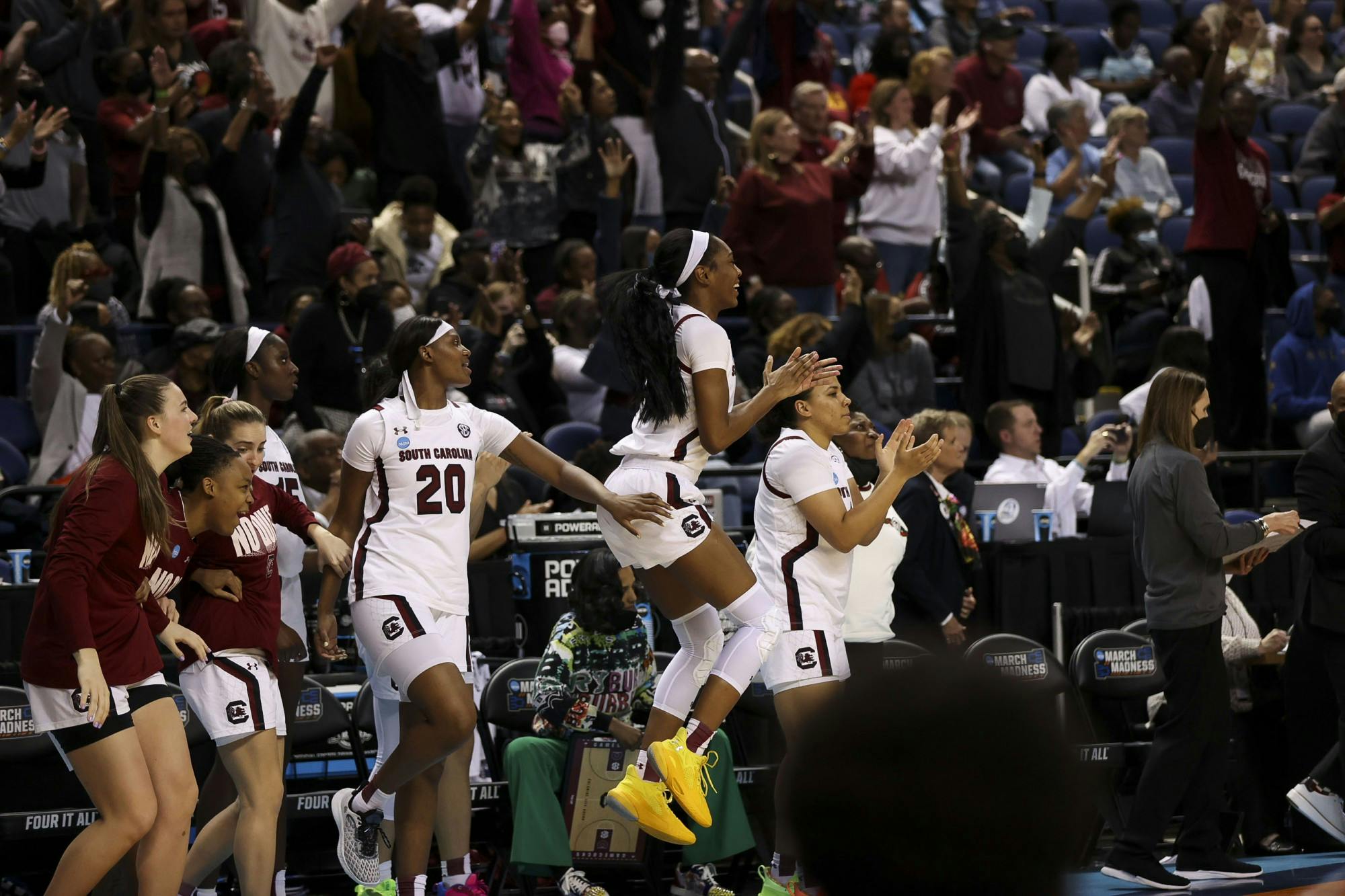 South Carolina Gamecocks celebrate advancing to the Elite Eight after their 69-61 victory over the North Carolina Tarheels on March 25, 2022.