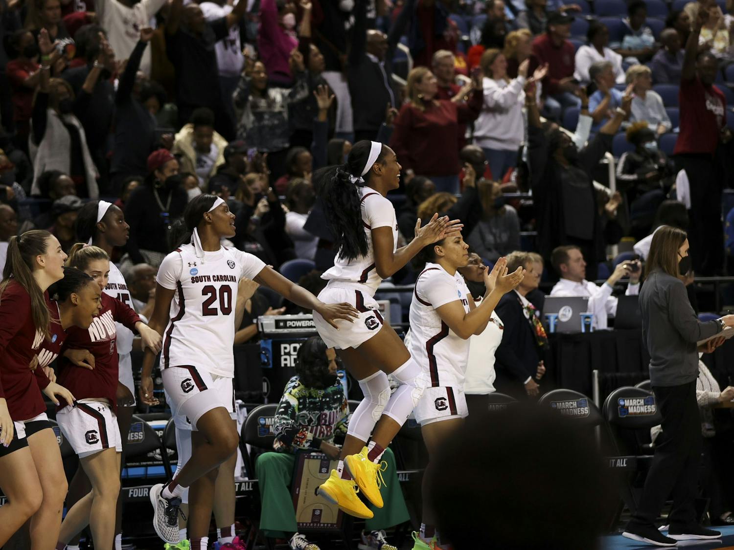 South Carolina Gamecocks celebrate advancing to the Elite Eight after their 69-61 victory over the North Carolina Tarheels on March 25, 2022.
