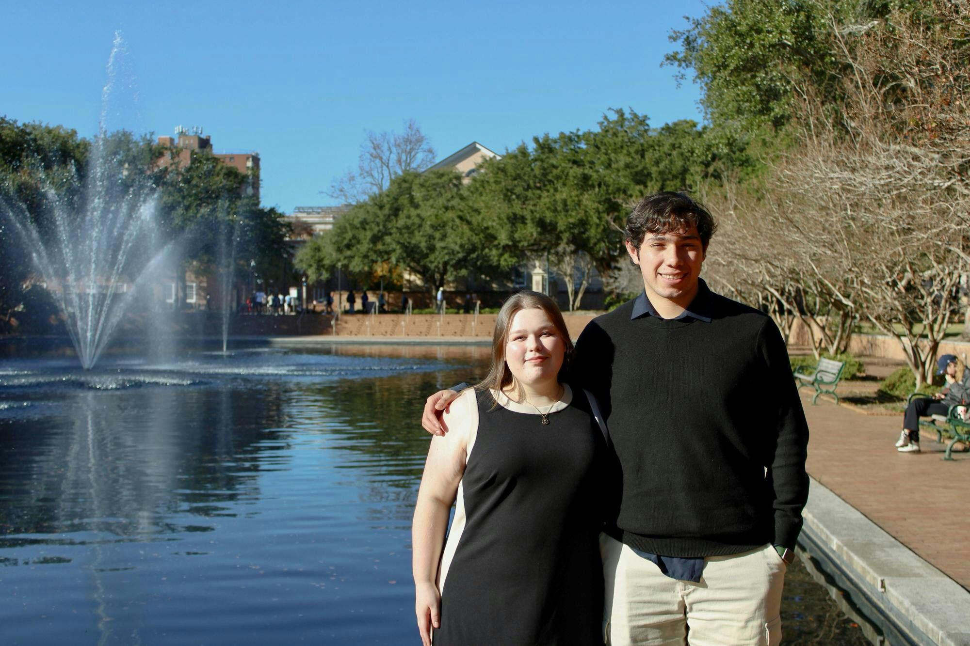Fourth-year finance student Eleanor McMakin and third-year economics student Dan Contreras pose in front of the Thomas Cooper water fountain on Nov. 14, 2025. McMakin and Contreras got the chance to be chosen as Navigators by the United Nations Research Institute for Social Development and will be able to travel around the world.