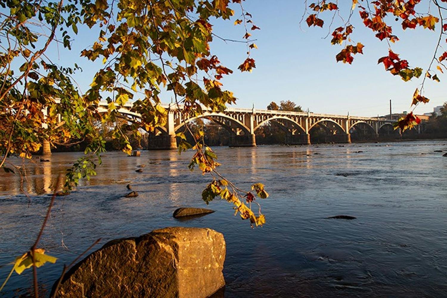 FILE—The sun rises over the Congaree River and the Gervais Street Bridge. The Congaree River flows through downtown Columbia at the junction of the Saluda River and the Broad River.&nbsp;