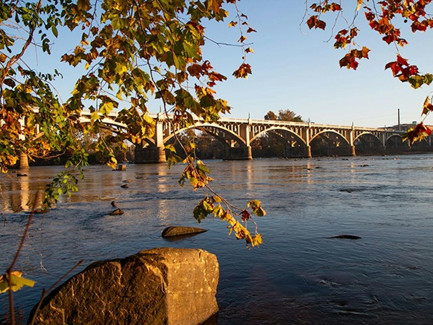 FILE—The sun rises over the Congaree River and the Gervais Street Bridge. The Congaree River flows through downtown Columbia at the junction of the Saluda River and the Broad River. 