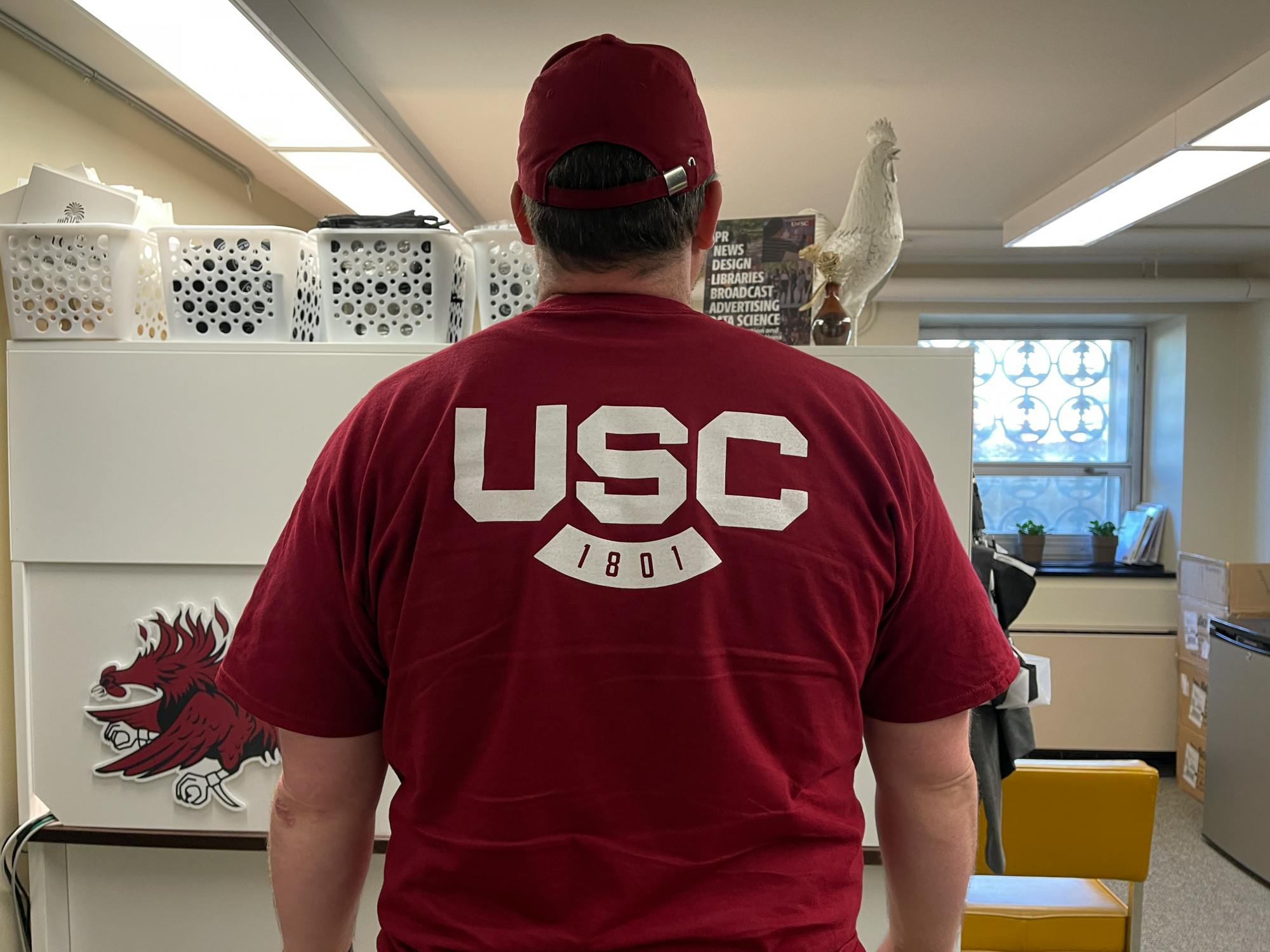 A university employee wears a t-shirt with the new USC spirit mark on March 29, 2023. The university announced the new logo on Oct. 26, 2022. 