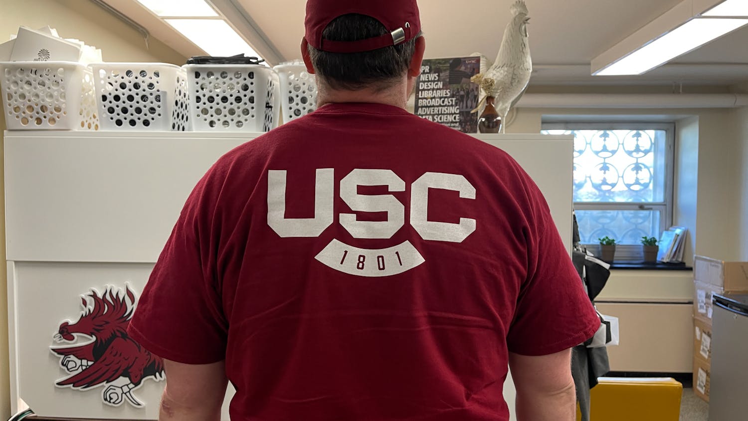 A university employee wears a t-shirt with the new USC spirit mark on March 29, 2023. The university announced the new logo on Oct. 26, 2022. 