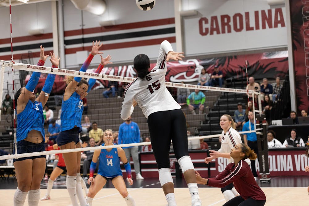 <p>Junior outside hitter Nia Hall prepares to spike the ball in the volleyball game against Ole Miss on Nov. 12, 2025. Hall scored the point through the blockers.</p>