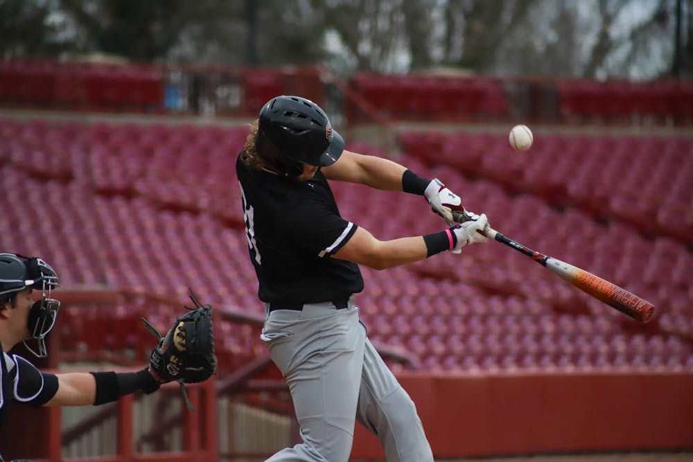 <p>FILE—Sophomore redshirt outfielder David Cromer smacks the ball into the air for the Black team at the Garnet and Black scrimmage on Feb. 1, 2023, at Founders Park. The Garnet team beat the Black team 4-2. The University of South Carolina will take on UMass Lowell at 4 p.m. on Feb. 17, 2023, for the first home game of the season.</p>