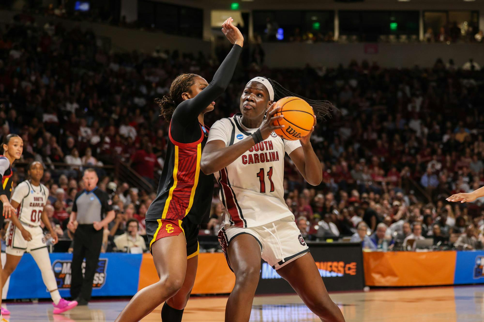 Senior center Madina Okot fights for a layup during the NCAA Tournament matchup against Southern California on March 23, 2026. Okot made 15 rebounds and a season-high three assists.