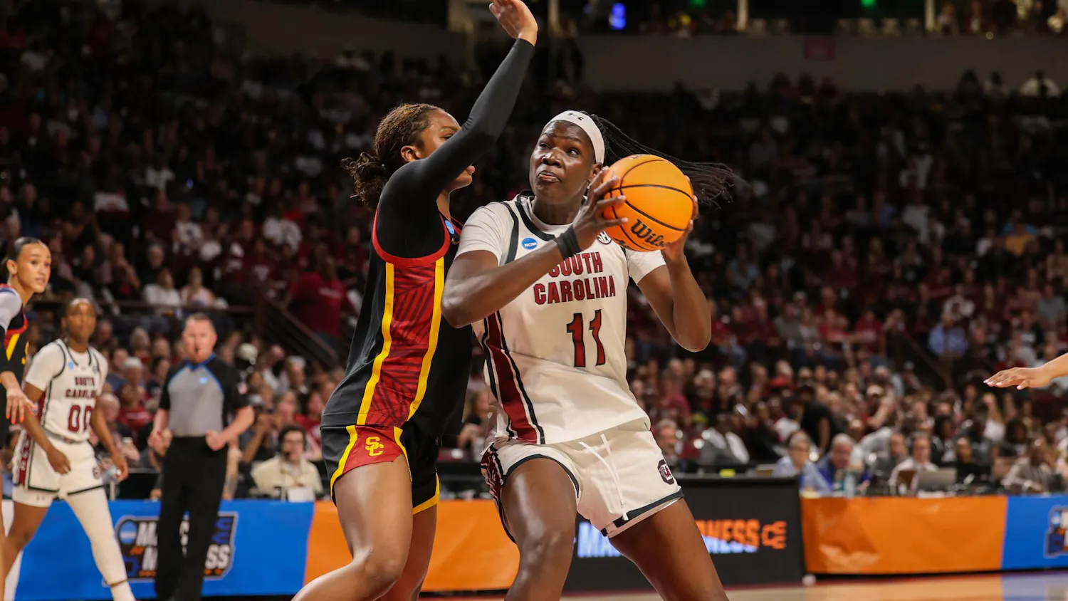 Senior center Madina Okot fights for a layup during the NCAA Tournament matchup against Southern California on March 23, 2026. Okot made 15 rebounds and a season-high three assists.
