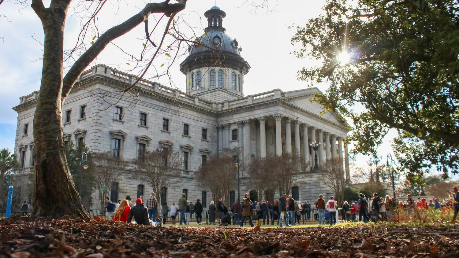 FILE - People arrived on the South Carolina Statehouse lawn as early as 2 p.m. for Donald Trump's late afternoon appearance on Jan. 28, 2023. Recently, South Carolina legislators ratified the state budget, allocating money to the University of South Carolina.