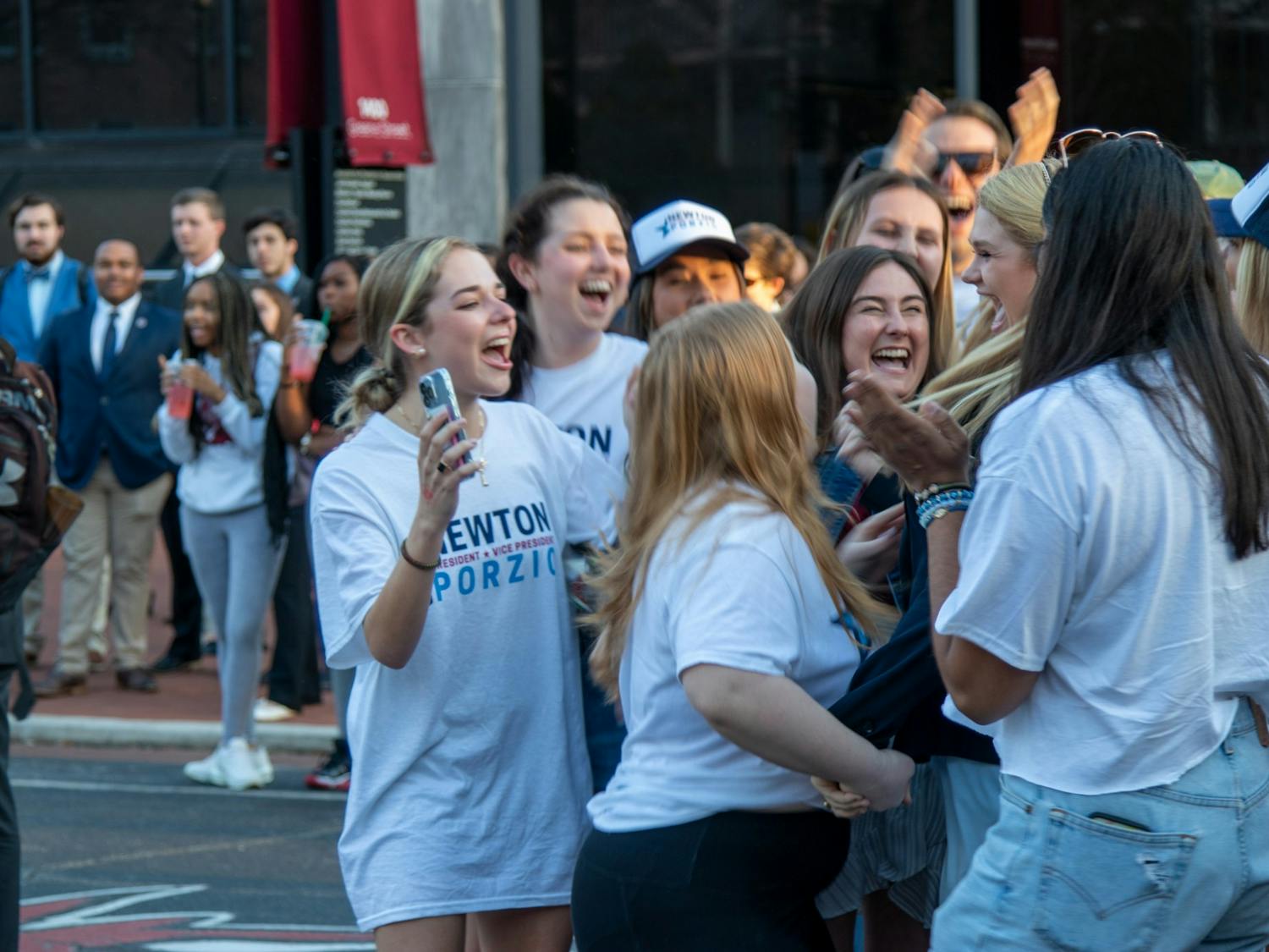 Vice President-elect Maia Porzio celebrates her victory on Feb. 23, 2022 on Greene Street. The Speaker of the Senate-Elect is Noah Glasgow. 