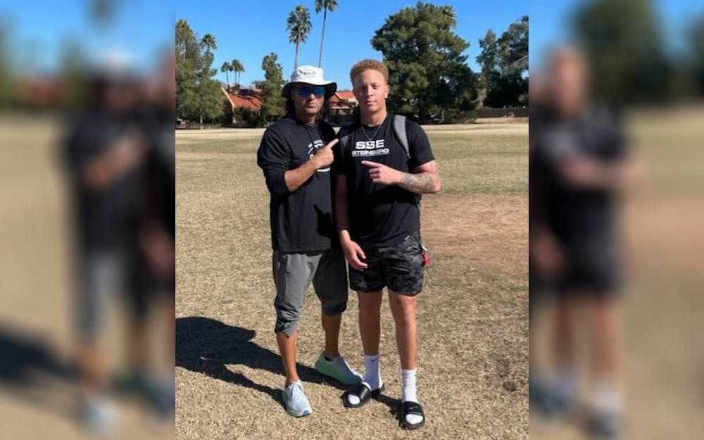 <p>Mike Giovando (left) and Spencer Rattler (right) in Scottsdale, Arizona in January 2022.</p>