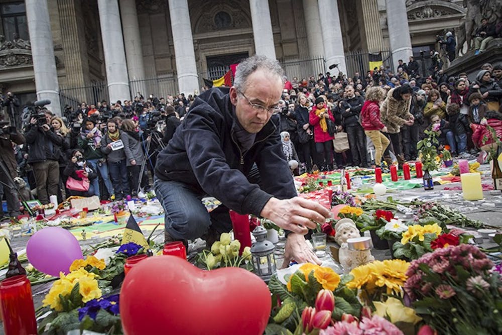 People gather to pay tribute to the victims of the Brussels attacks on March 23, 2016 in Brussels, Belgium. (Aurore Belot/Belga/Zuma Press/TNS) 