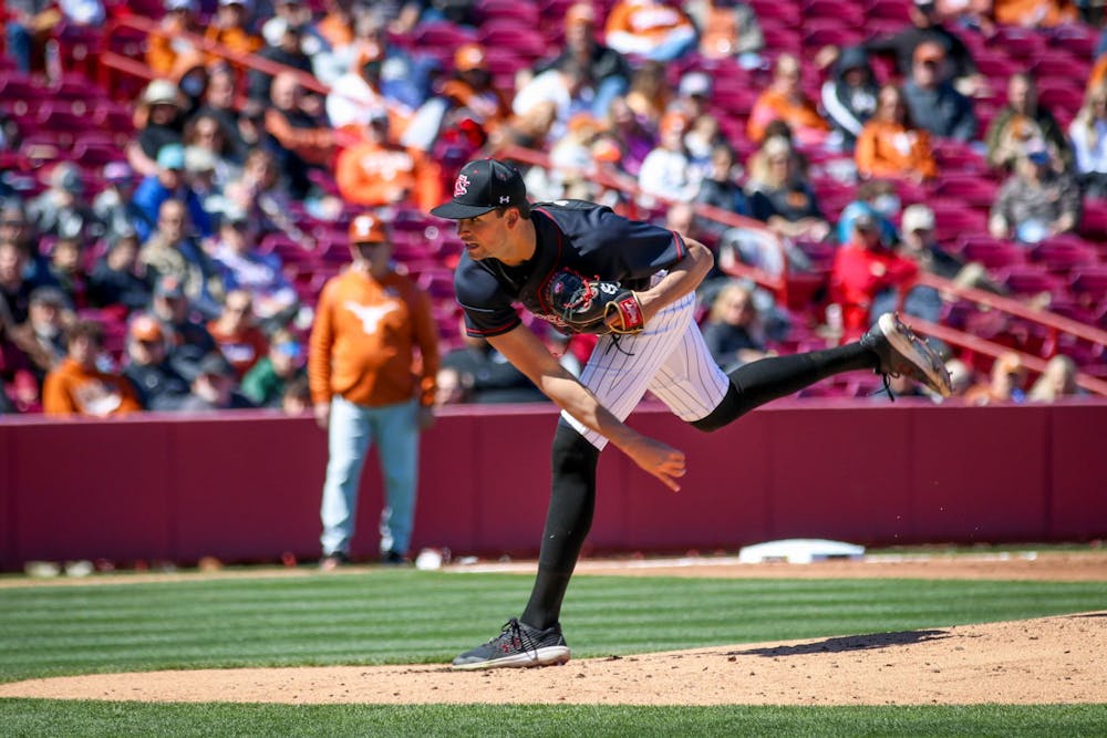 Sophomore Will Sanders pitches during the baseball game against Texas on March 13 at Founders Park. 