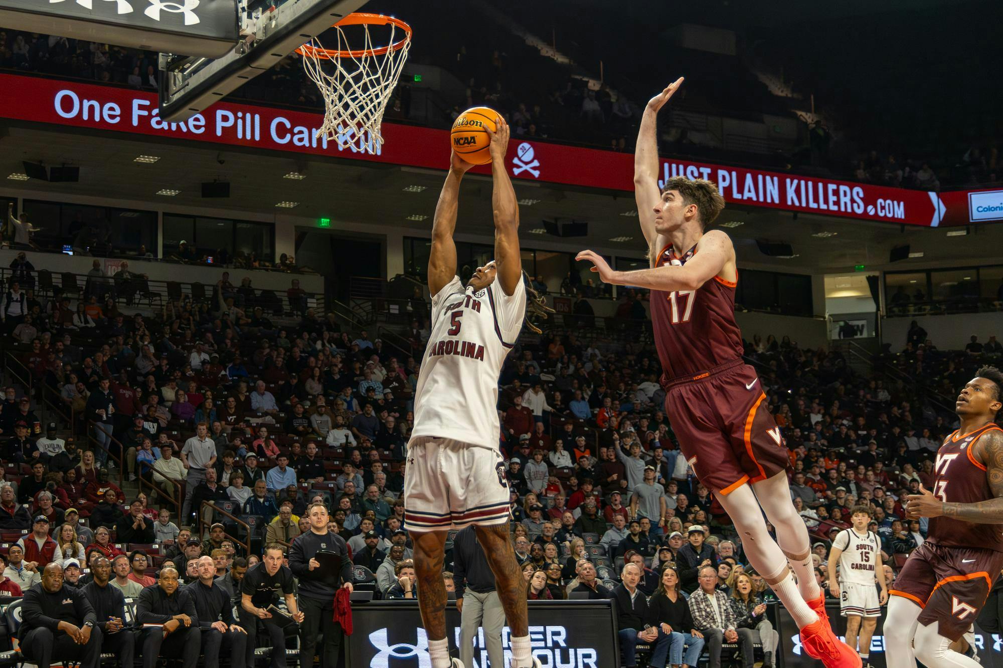 Redshirt senior guard Meechie Johnson attempts to dunk the basketball in front of a Virgina Tech defender on Dec. 2, 2025, at Colonial Life Arena. Johnson scored 18 points in the Gamecocks' 86-83 loss to the Hokies.