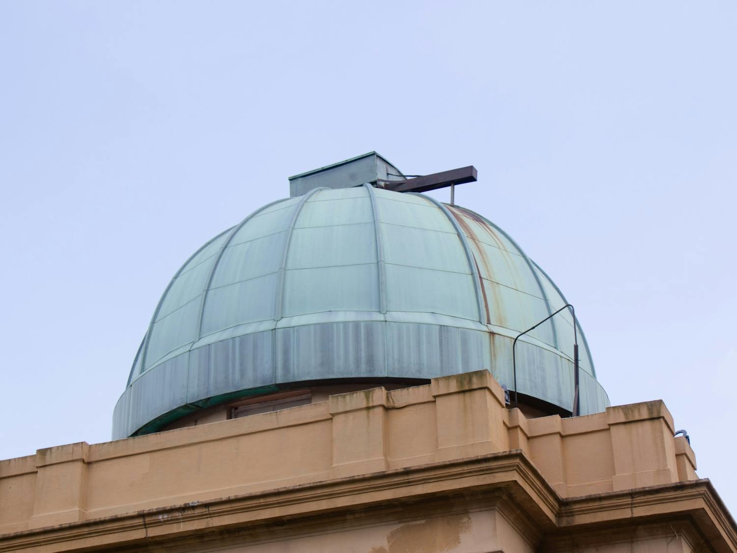 A picture of the green dome that sits atop the historic Melton Observatory on June 13, 2022. The observatory houses a 16-inch Cassegrain telescope, enabling a viewer to gaze at our vast universe.&nbsp;