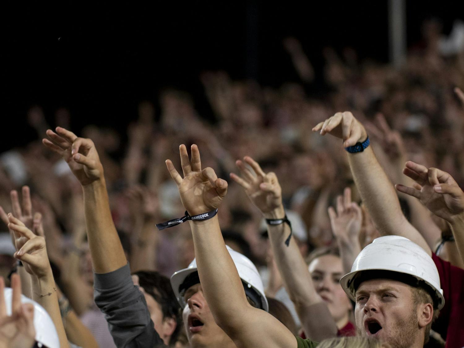 South Carolina students wave three fingers and yell to put pressure on Mississippi State during third down at Williams-Brice Stadium on Sept. 23, 2023. The Gamecocks defeated the Bulldogs 37-30, making South Carolina 2-2 overall for the season.