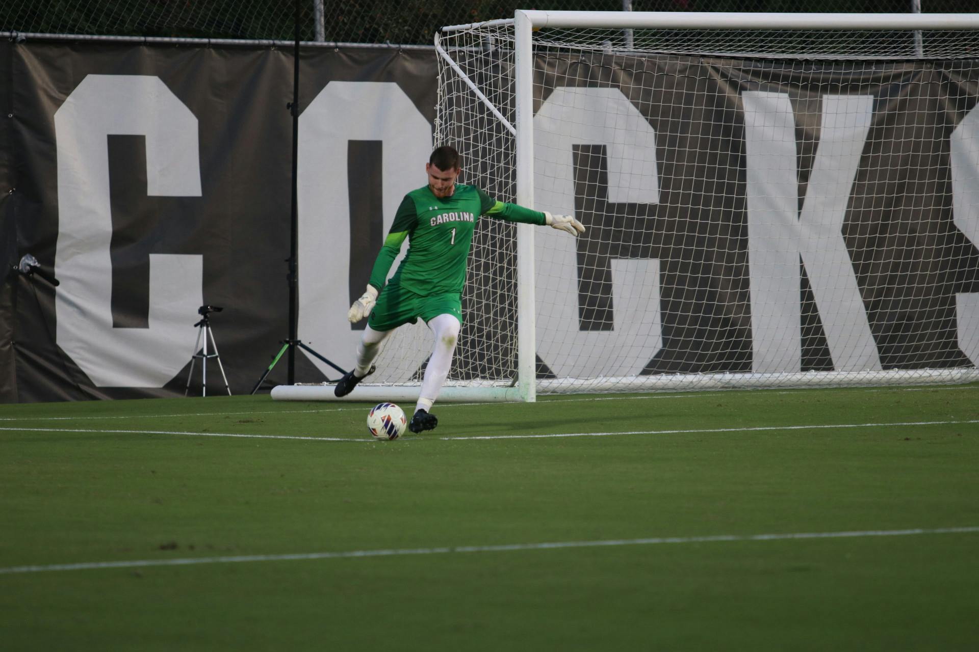 Freshman goalkeeper Ben Alexander kicking the ball back into play during South Carolina's match against Clemson on Sep. 2, 2022.