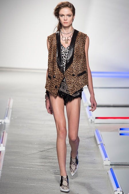	A rocker-chic leopard print vest was paired with another color leopard print top and without a doubt made the entire thing look effortless at Rodarte.