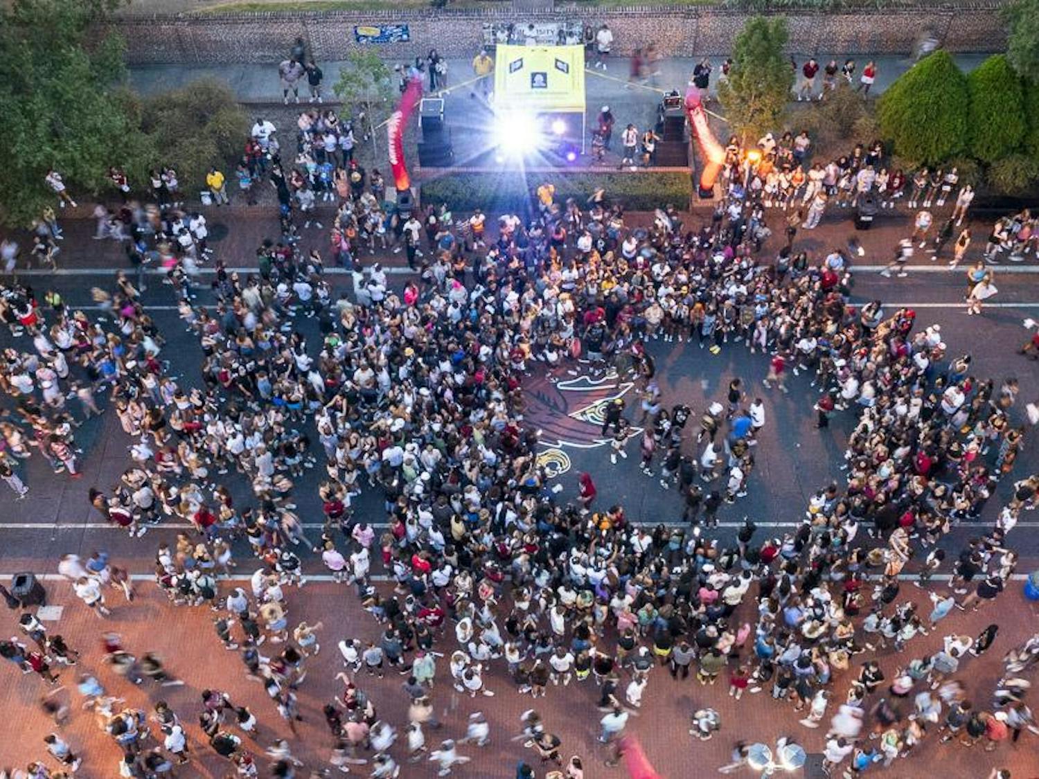 Students gather along Greene Street during the First Night Carolina event on Aug. 23, 2023. The event featured musical acts from Columbia-based DJ iAM and Charlotte-based rock band The L.A. Maybe.