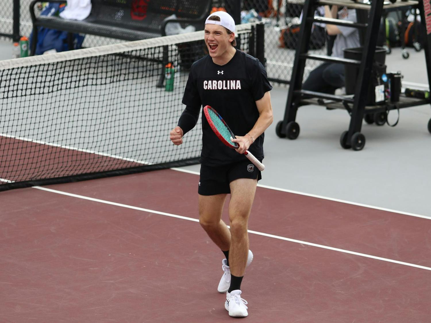 Sophomore Max Stenzer celebrates after he and junior Sean Daryabeigi won a point in doubles against the University of Texas Feb. 27, 2026. The pair won their match against the Longhorns 7-5.