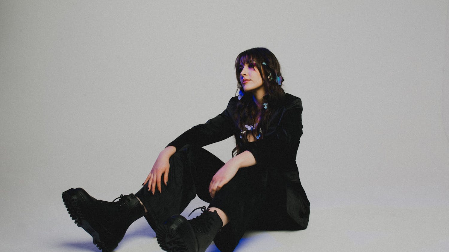 A photo illustration of USC alumna Mackenzie Morrow for her newly released album "Black Butterfly." The album was cultivated over the past four years and talks about the highs and lows of life.