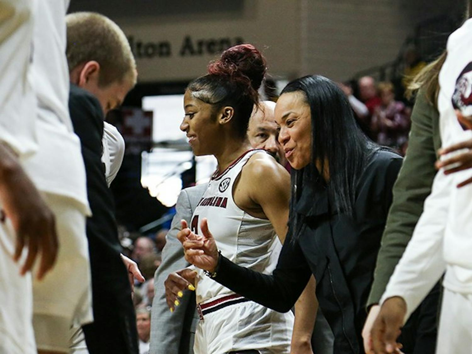 Head coach Dawn Staley talks to players during a timeout at the first round of the NCAA playoffs in the Halton Arena on Friday.&nbsp;