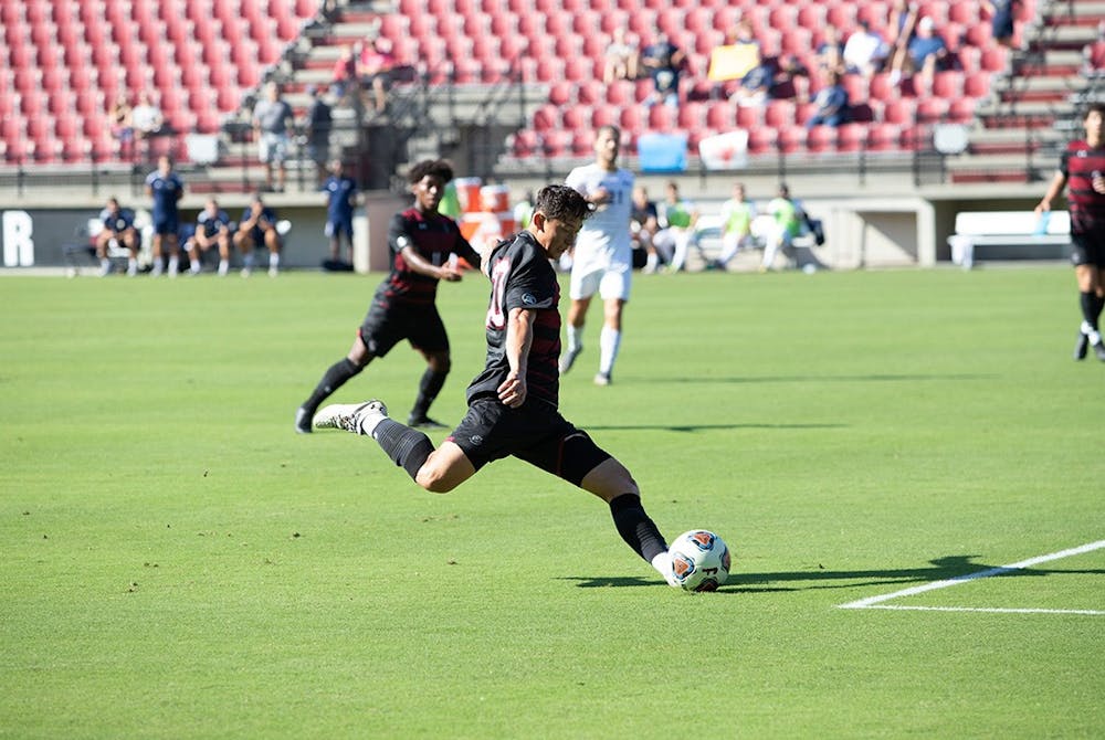 <p>Sophomore forward Peter Clement aims for the goal and kicks the ball. The Gamecocks lost to the Panthers 4-1, and play their next game against Kentucky on Saturday, Oct. 23.&nbsp;</p>