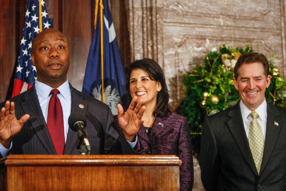 U.S. Rep. Tim Scott speaks Monday to reporters at the South Carolina Statehouse after being introduced by Governor Nikki Haley to fill the vacant U.S. Senate seat vacated by the departing DeMint, December 17, 2012. (Tim Dominick/The State/MCT)