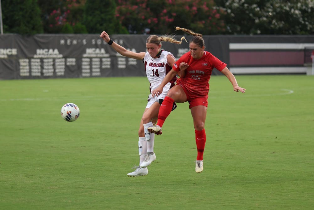 <p>FILE — Senior defender Taylor Bloom attempts to kick the ball against an opposing player during the game against Ohio State at Eugene E. Stone III Stadium on Aug. 21, 2025. The Gamecocks is 7-1-1 (1-0 SEC) on the season after defeating Alabama to open conference play.</p>