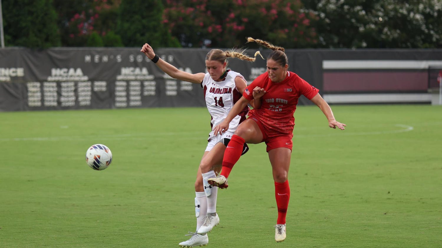 FILE — Senior defender Taylor Bloom attempts to kick the ball against an opposing player during the game against Ohio State at Eugene E. Stone III Stadium on Aug. 21, 2025. The Gamecocks is 7-1-1 (1-0 SEC) on the season after defeating Alabama to open conference play.