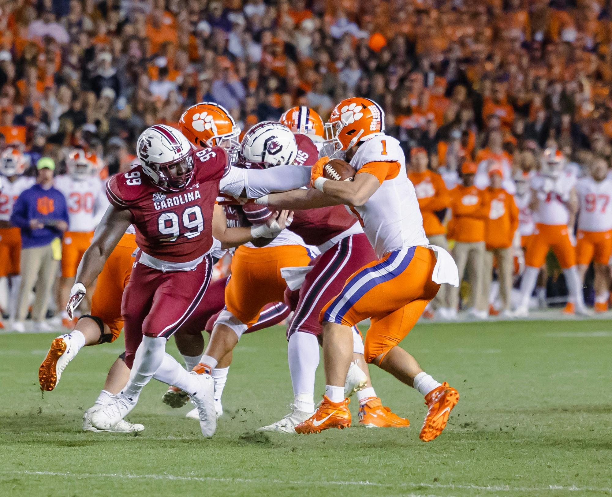 Defensive Lineman Jabari Ellis attempts to grab the ball against the Clemson Tigers running back Will Shipley. The Tigers won 30-0 against the Gamecocks.