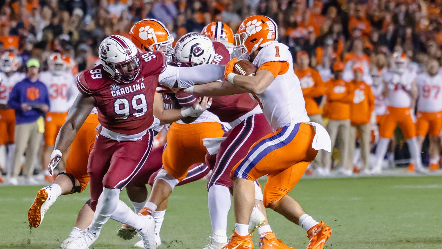 Defensive Lineman Jabari Ellis attempts to grab the ball against the Clemson Tigers running back Will Shipley. The Tigers won 30-0 against the Gamecocks.