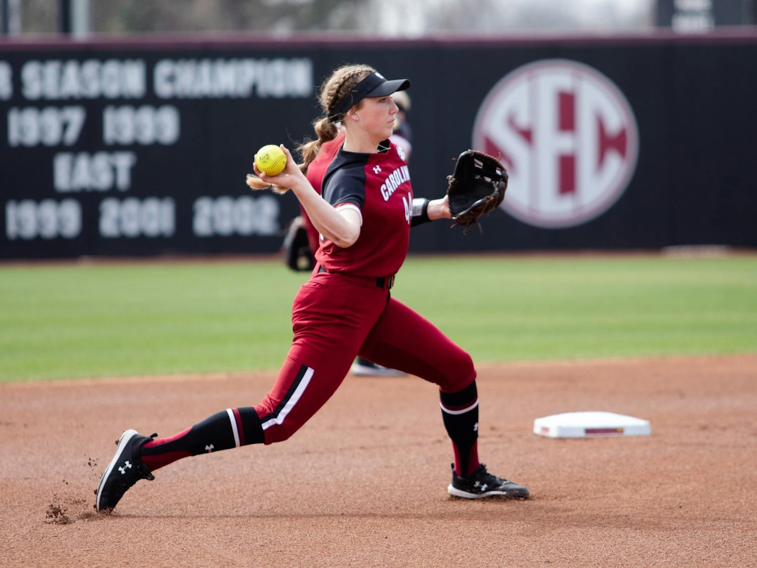 Freshman third baseman Emma Sellers winds up for a throw during a game against Lipscomb on Saturday, Feb. 12, 2022 in Columbia, SC.